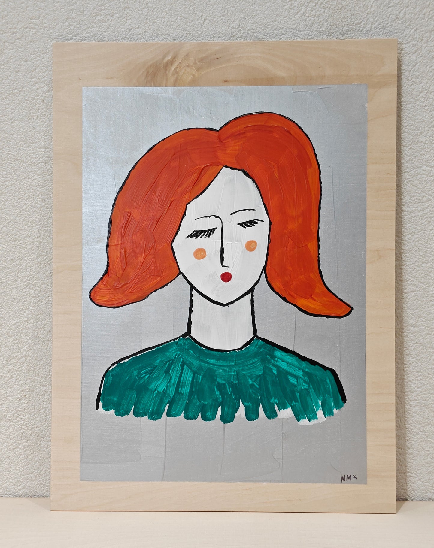 Acrylic painting on birch plywood. Woman in green top and bright orange hair. Backdrop is silver.
