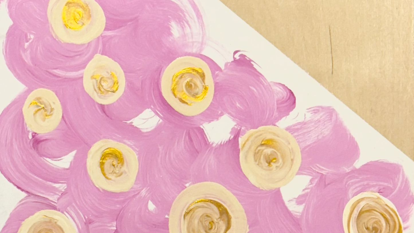 Close up top view of Plywood side table with hand-painted unique design in pink, white and gold.